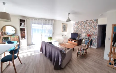 Ambiance chaleureuse pour ce salon - salle à manger lumineux
