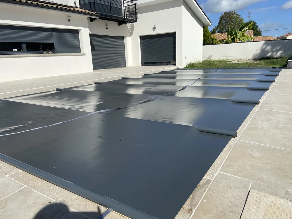 Installation couverture de sécurité à barres gris anthracite à Montussan proche bordeaux