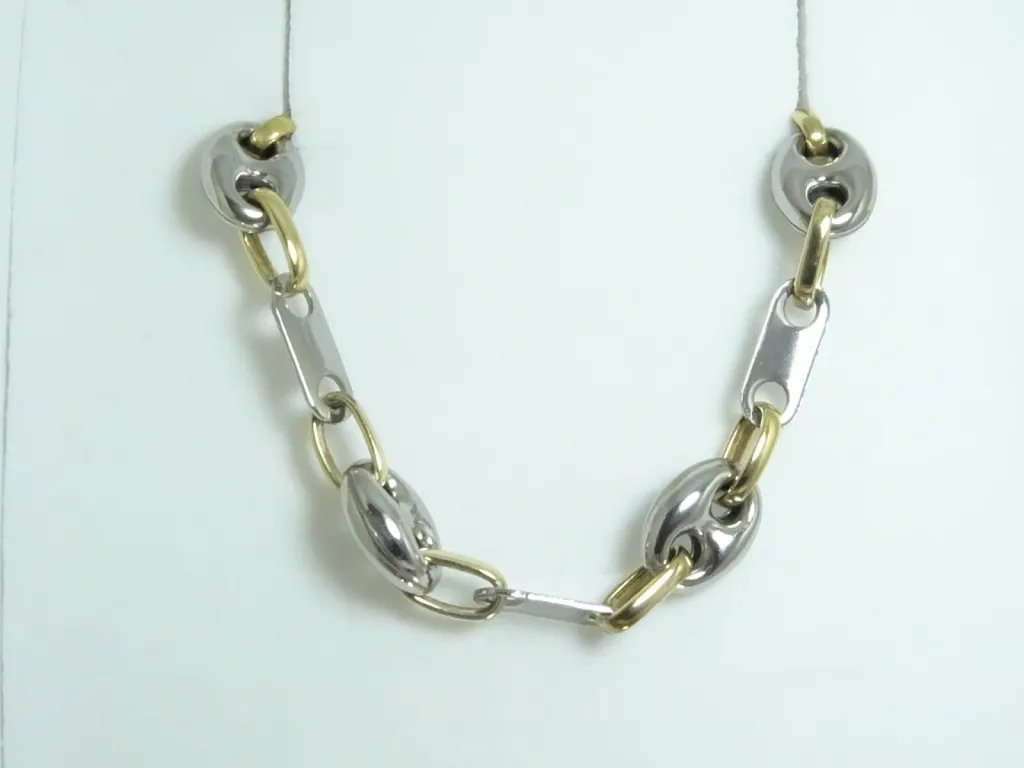 Chaîne en acier et or jaune pour homme.