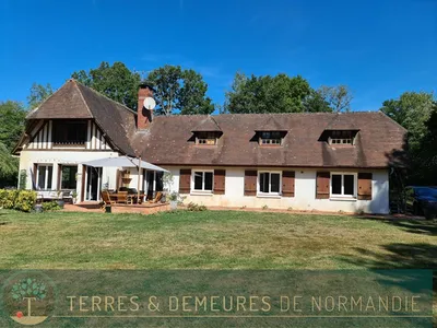 En vente, dans un bel environnement, Maison Familiale sur un terrain de 1.2 hectares, à 9 min. de Cormeilles 27260