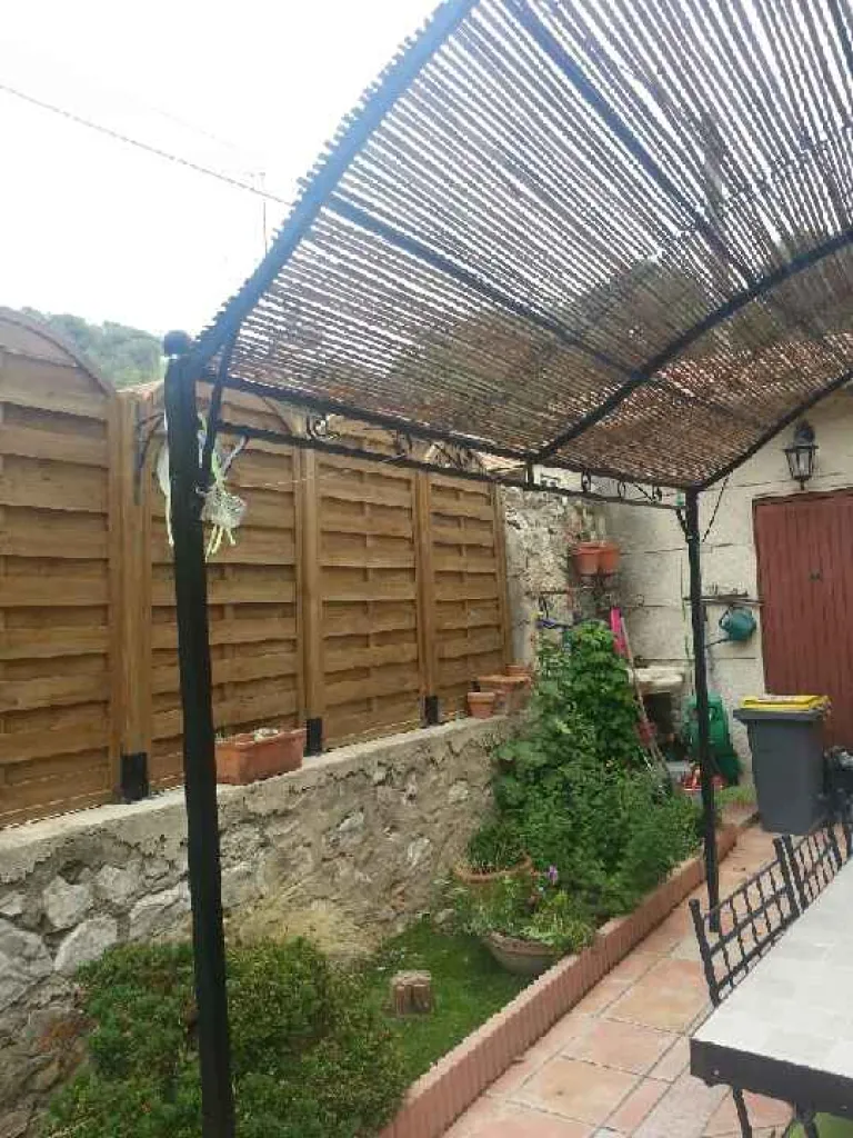 TONNELLE EN FER FORGE ROGNAC