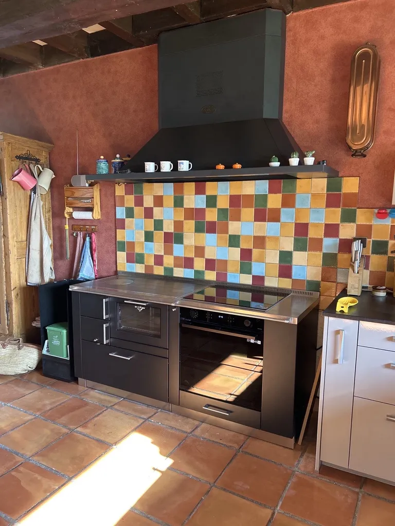 Cuisinière mixte bois électricité PERTINGER ÖKOALPIN 100 installée à Saint-Heand Saint-Étienne 42