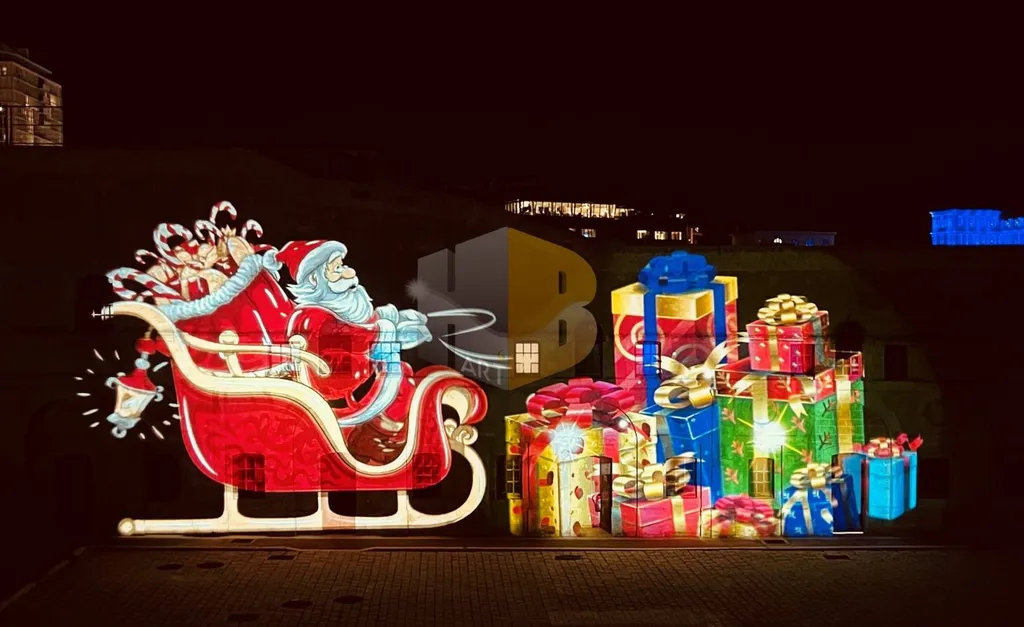 Gobos de Noël animés projetés sur bâtiment municipal à Marseille