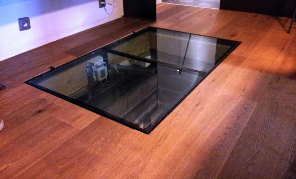 EP Fermeture, expert français de la fabrication artisanale de trappes de sol sur mesure haut de gamme