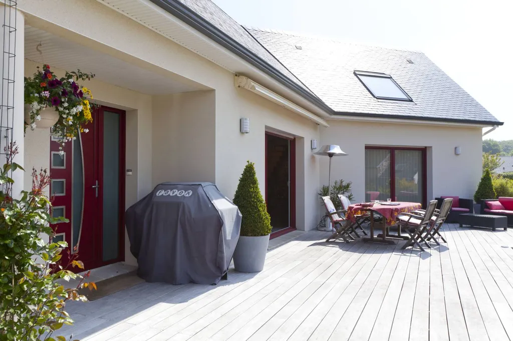 Construction d’une maison en boomerang en ardoise naturelle proche du Havre 76