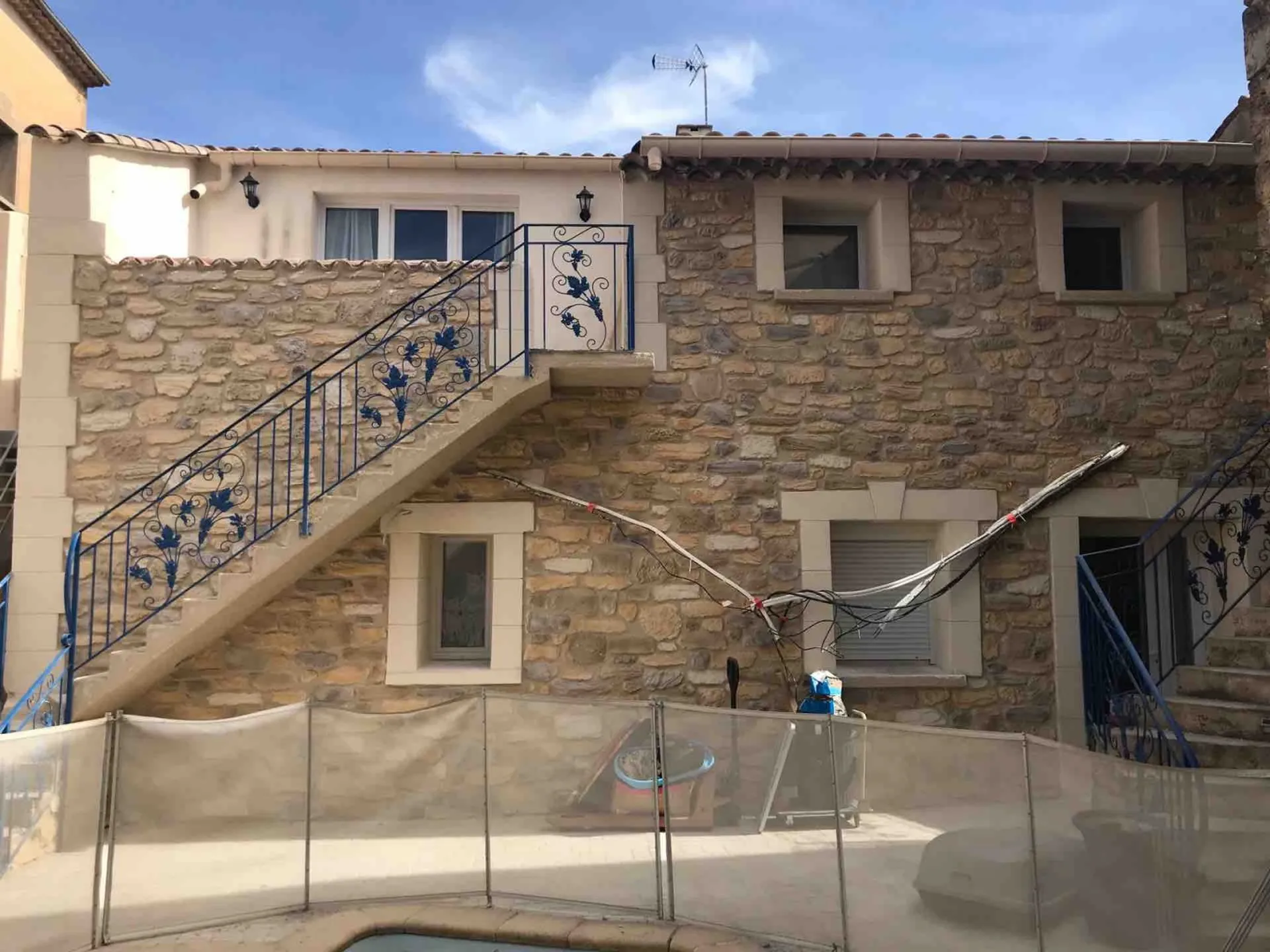 Rénovation mur en pierre sur une maison de village à Boujan-sur-Libron proche de Béziers