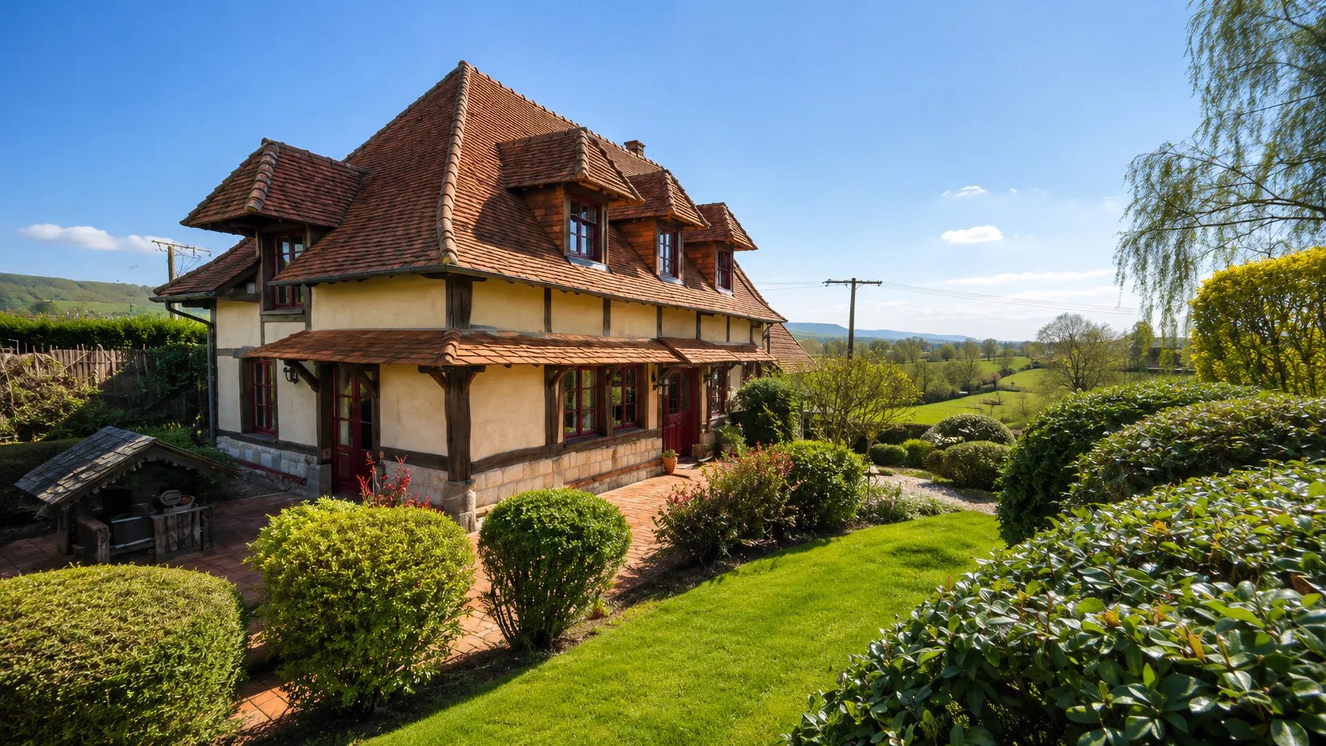 Immobilier en Normandie : Maison avec dépendances et garage : Un garage/atelier de 20 m² jouxtant le gîte, idéal pour stockage ou bricolage.