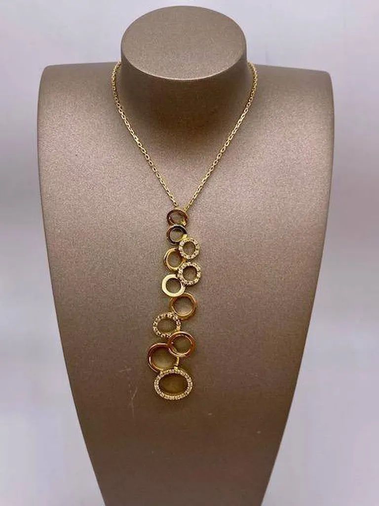 Collier en or 750/1000ème original avec chaine et pendentif multi anneaux diamantés en dépôt vente chez la bijouterie Or Ligne à La Teste de Buch sur la Bassin d'Arcachon