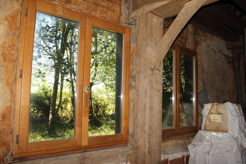 Visite d'un pressoir à colombages à finir de restaurer en Normandie 27