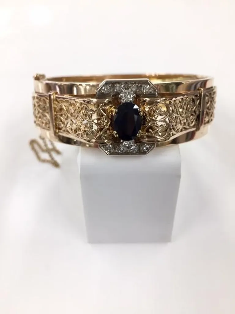 Bracelet manchette rigide ouvrant or 750/1000ème saphir et diamants occasion Or Ligne La Teste bassin d'arcachon