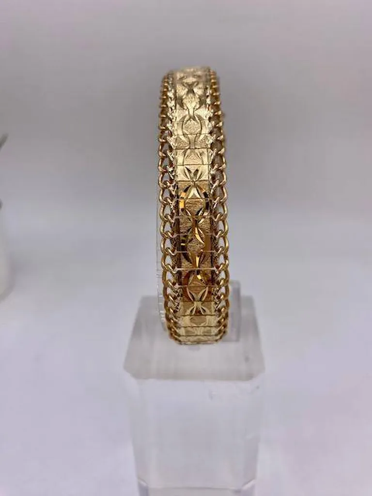 Bracelet dit ruban en or 750/1000ème finement ciselé en dépôt vente chez Or Ligne à La Teste sur le Bassin d'Arcachon