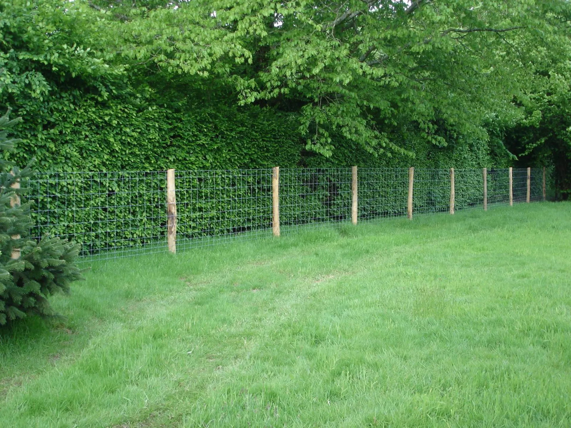 Réalisation d'une clôture champêtre périphérique pour jardin à Touques 14  