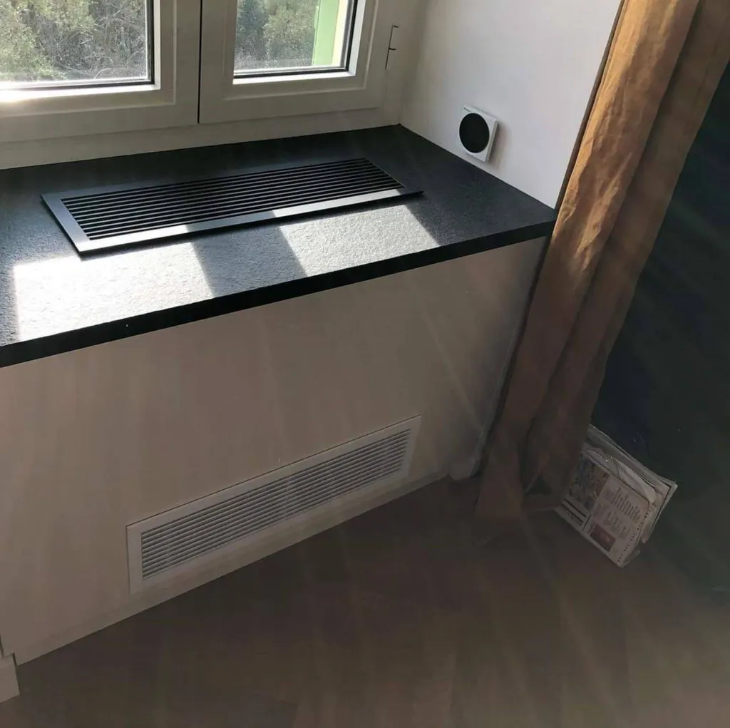 Intégration d'une climatisation console non carrossée dans un meuble sur mesure à Cannes