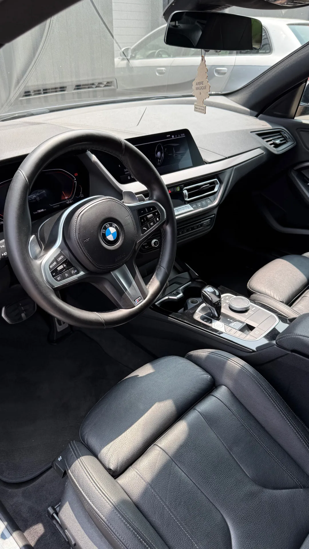 Nettoyage haut de gamme intérieur et extérieur d’une BMW Série 1 Coupé, avec soins techniques et finitions professionnelles à Andrézieux-Bouthéon
