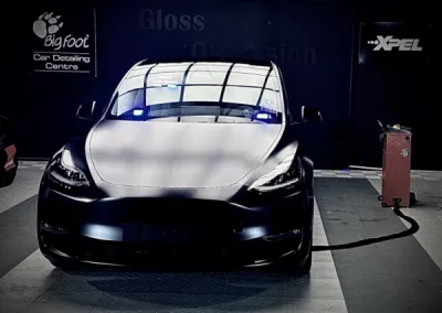 Comment protéger ma Tesla Model Y Noire avec un Film de protection Xpel Stealth Mat après la livraison de mon véhicule Neuf.