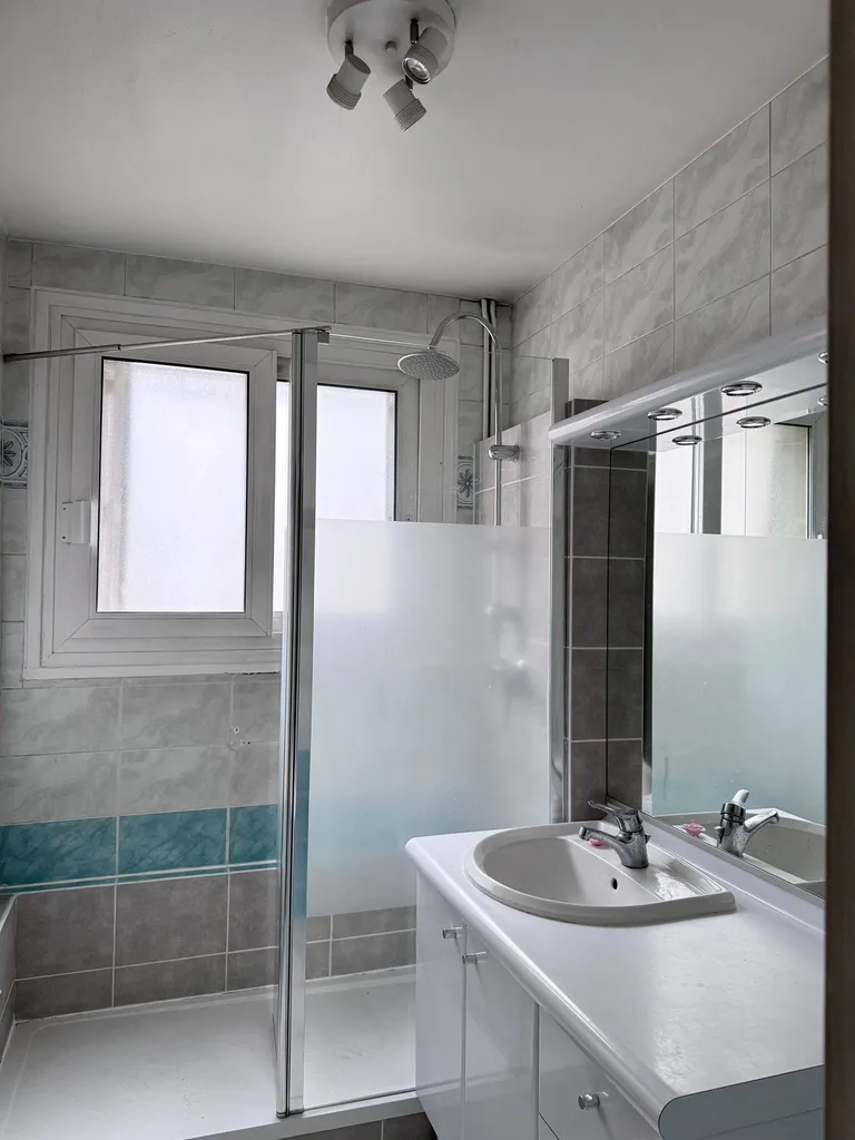 Appartement 4 chambres avec garage + cave / AVENUE JACQUES CARTIER