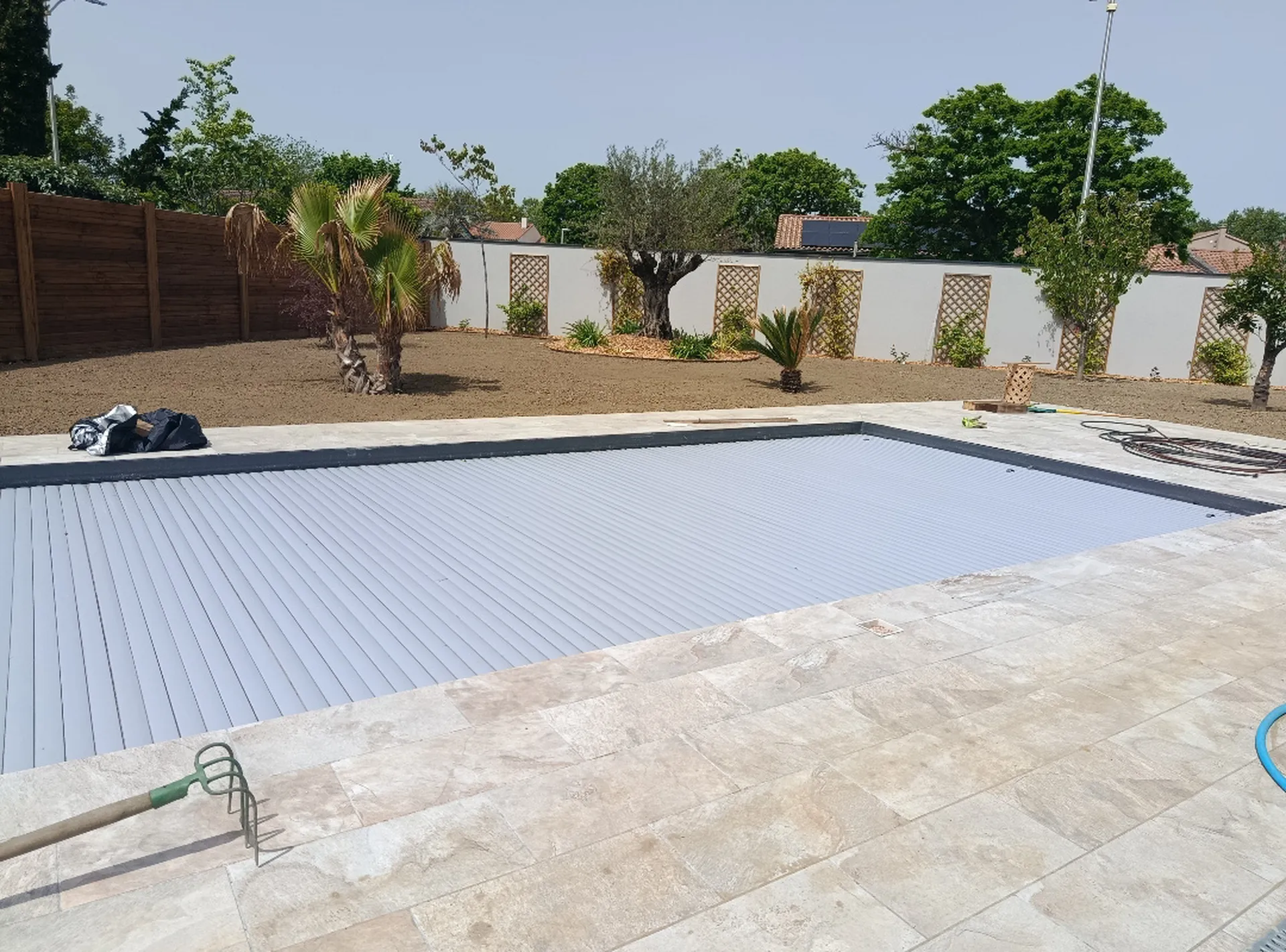 Arrosage intégré sur programmateur avec économie d'eau pour gazon et plantation à Tournefeuille proche de Colomiers.