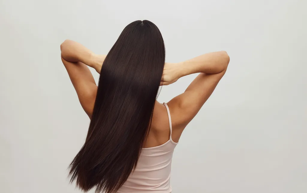 Lissage brésilien professionnel pour cheveux disciplinés, réparation intense et résultat durable réalisé par coiffeur expert à Dijon