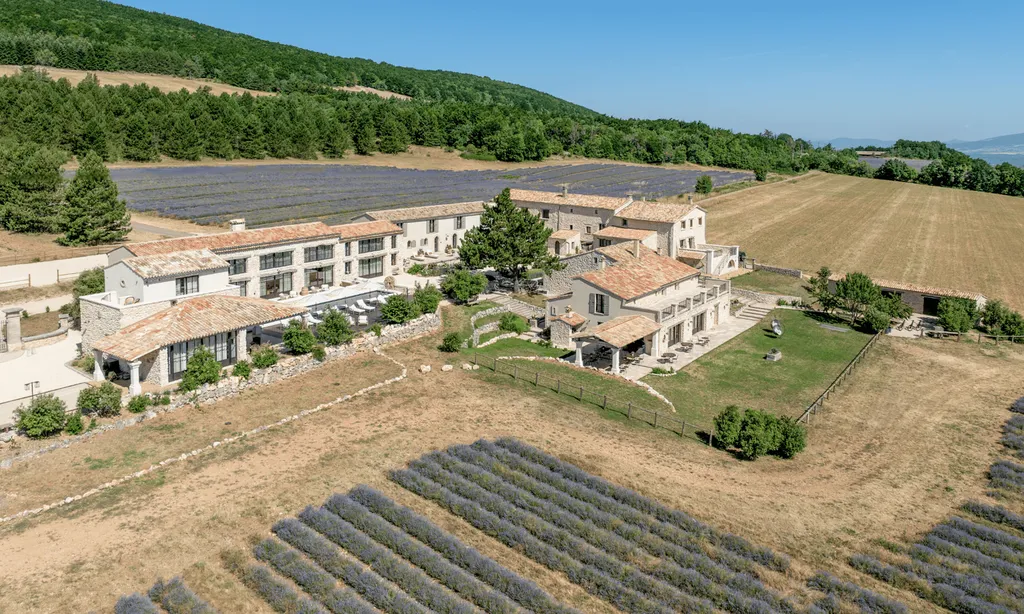 Domaine Château du Bois' main building, with its lap pool and lavender fields