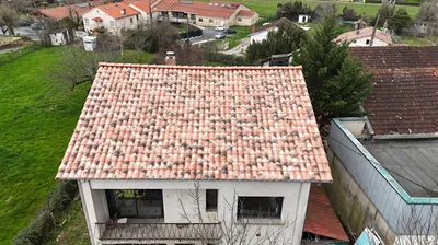 Rénovation de toiture avec remplacement de tuile à Briatexte