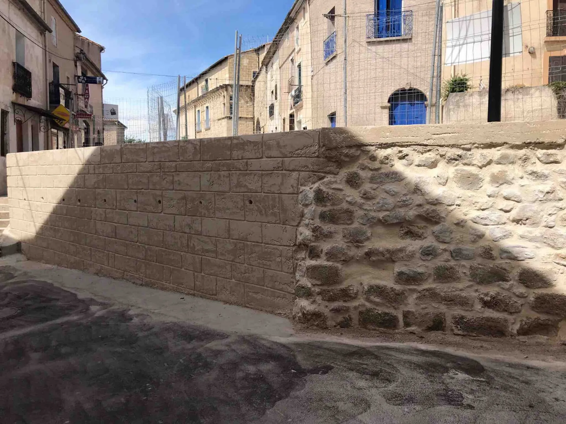 Réalisation d’un mur de soutenement en finition pierre de taille à Castelnau-de-Guers dans le 34