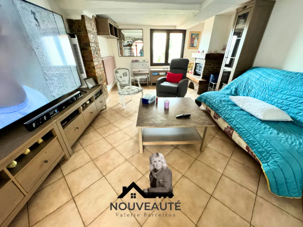 A vendre charmante maison traditionnelle de 100 m² édifiée sur un terrain de 411 m² sur la commune de ELBEUF 76500