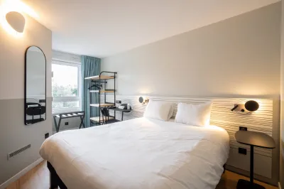 quelle photographe pro pour shooting photo de chambres d'hôtel à Le Pecq