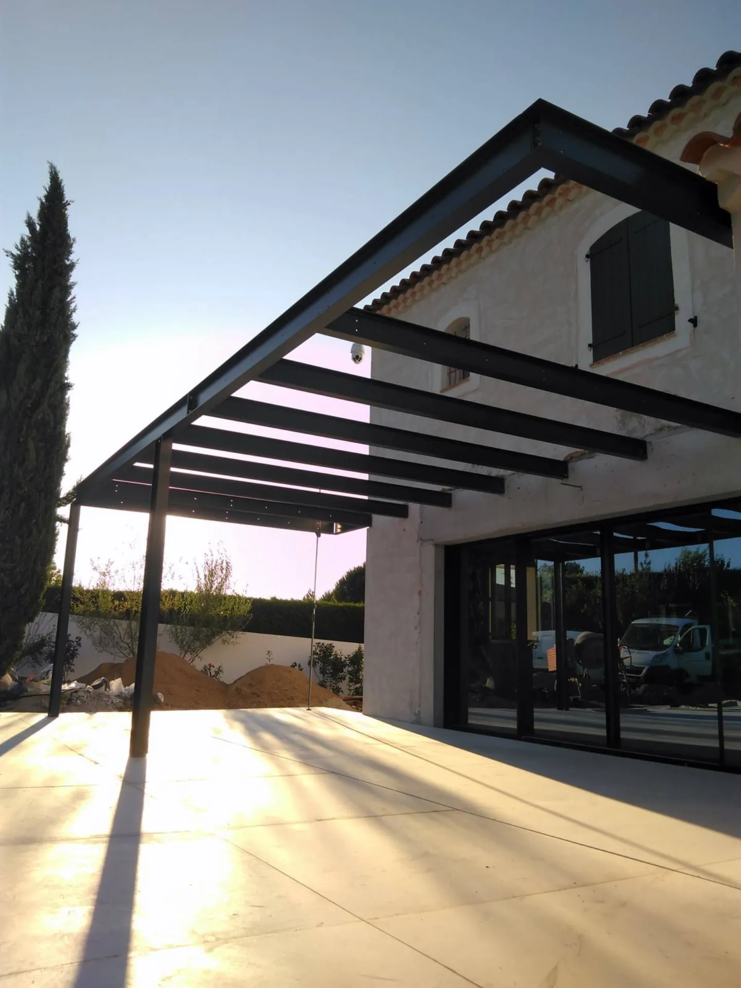 Thermolaquage d'une Pergola IPN / Bois rouge réalisé par GIANI Olivier