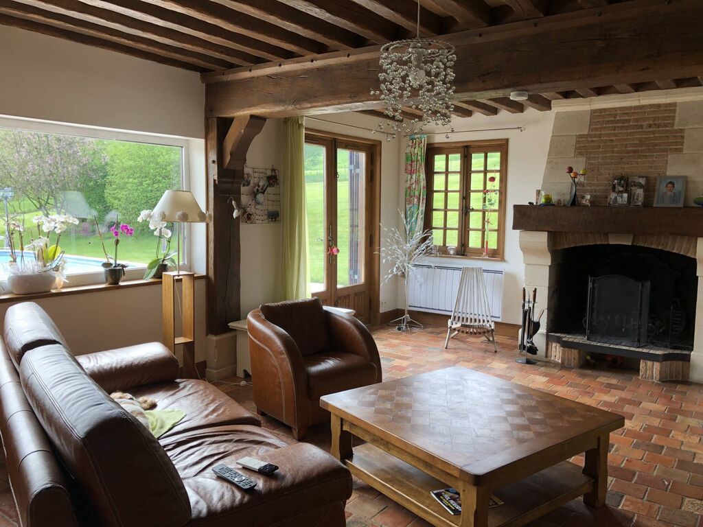 Acquisition d'une maison à pans de bois dans la région de Lisieux