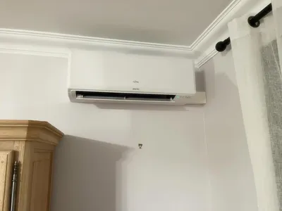 Pompe à chaleur air/air Atlantic FUJITSU dans un appartement à saint Laurent 06