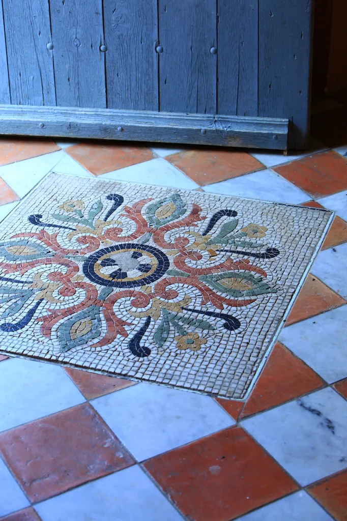 House caretakers in charge of finding the right contractor to take care of old terra-cotta floors  an old farm in Ansouis