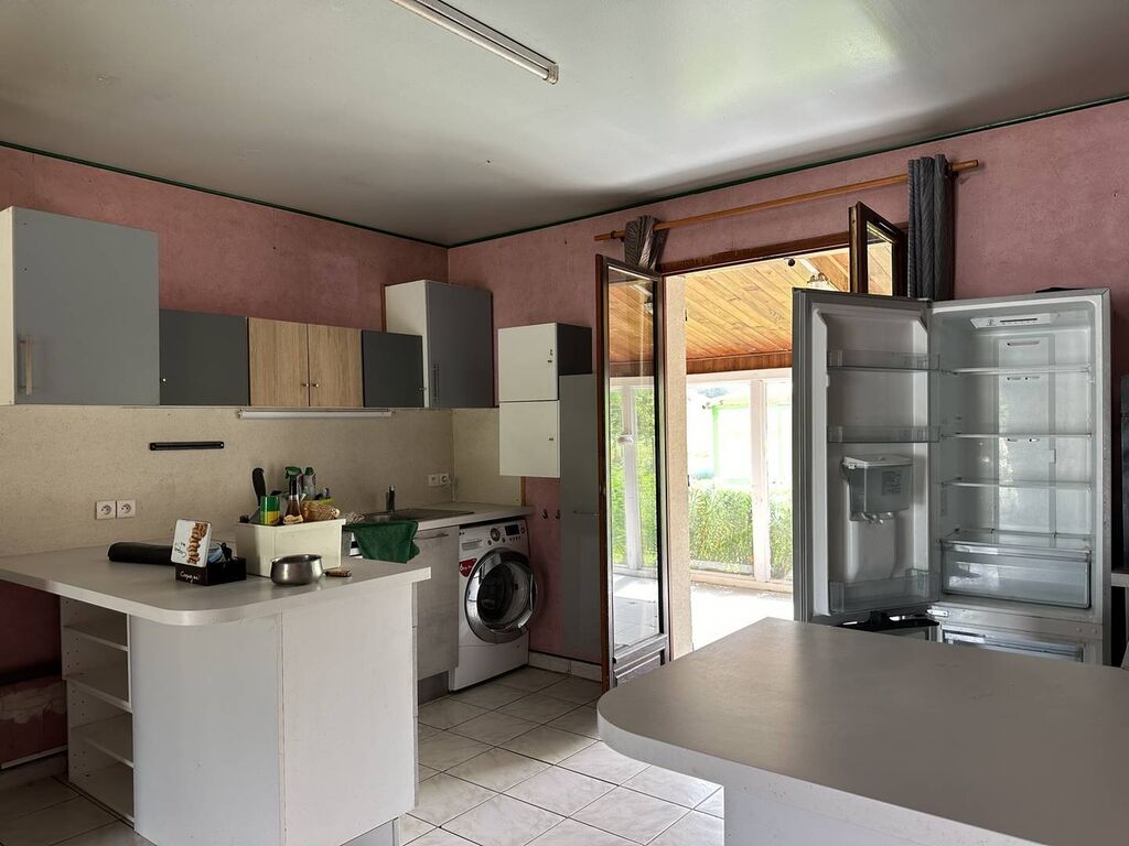 À vendre : Maison de 68 m², véranda lumineuse de 41 m², terrain de 1000 m². À 15 minutes de Forges-les-Eaux, parfaite pour les amateurs de jardinage.