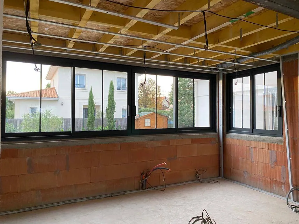 Pessac pose d'un coulissant aluminium pour du neuf