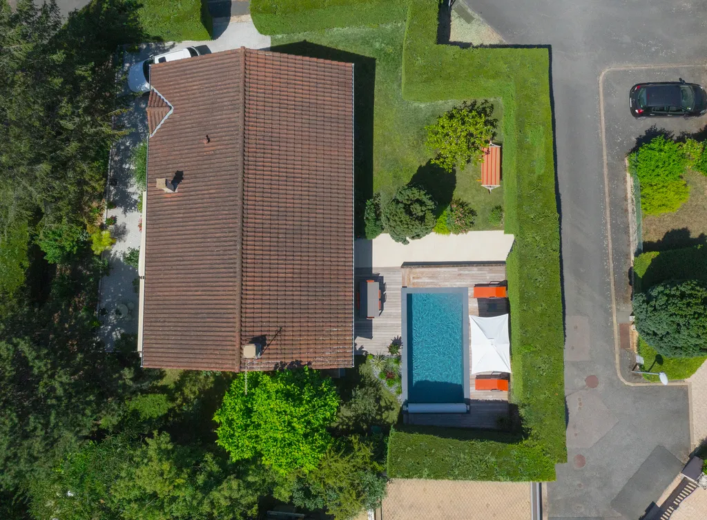 Construction de piscine et aménagement paysager à Genay
