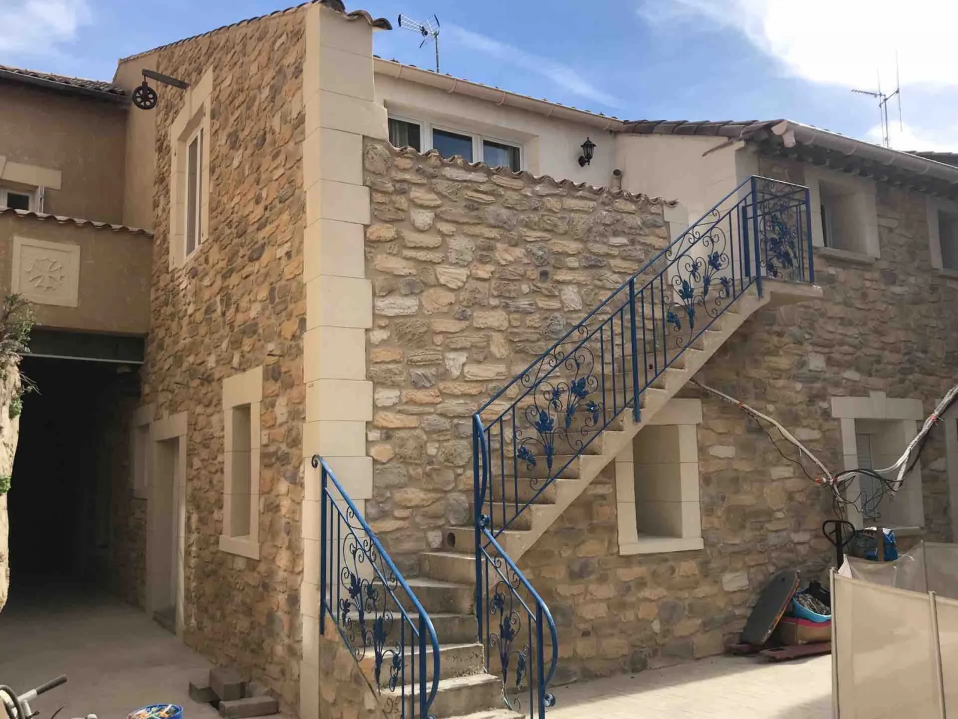 Rénovation mur en pierre sur une maison de village à Boujan-sur-Libron proche de Béziers