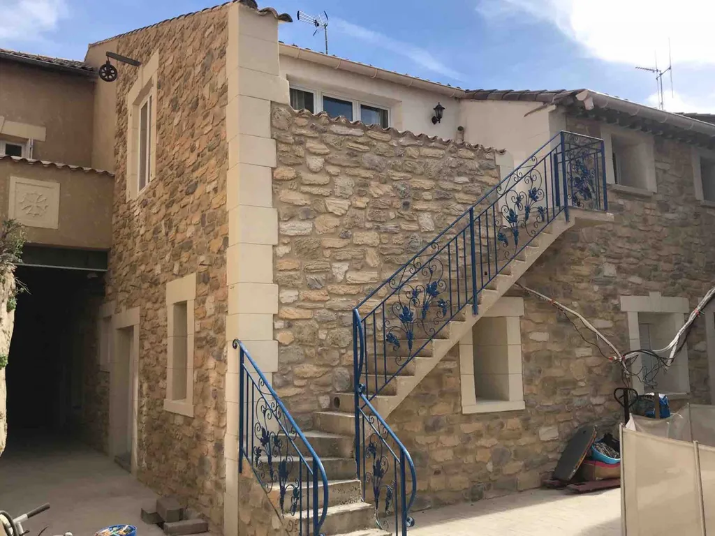 Rénovation mur en pierre sur une maison de village à Boujan-sur-Libron proche de Béziers