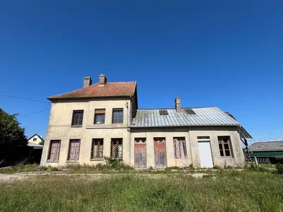 EXCLUSIVITE à vendre : Maison de caractère à rénover offrant de beaux volumes et située à la Mailleraye sur Seine
