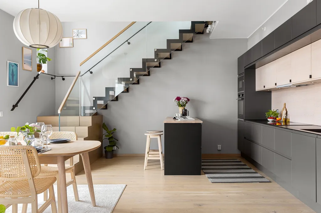 Conception sur mesure par notre cabinet d’architecture d’intérieur pour restructurer entièrement une cuisine ouverte sur le salon à Bordeaux