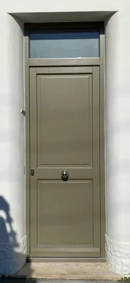 Rénovation avec une porte bois fabriquée sur Bordeaux par Aquit'M