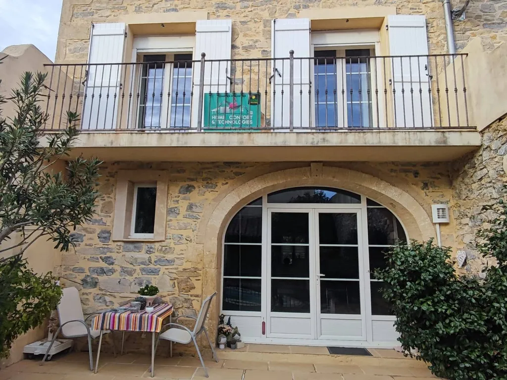 Installation de volets effet bois sur mesure près de Nîmes sur la commune de Fons