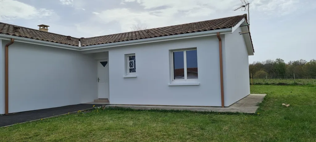Peinture d'une façade de maison située à TRESSES rive droite