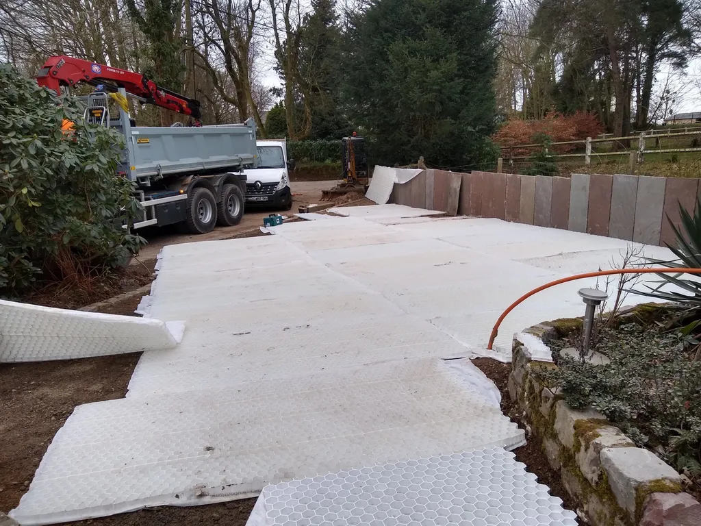 Création minérale complète au Havre (76600) : allée, parking, clôture et murs de soutènement