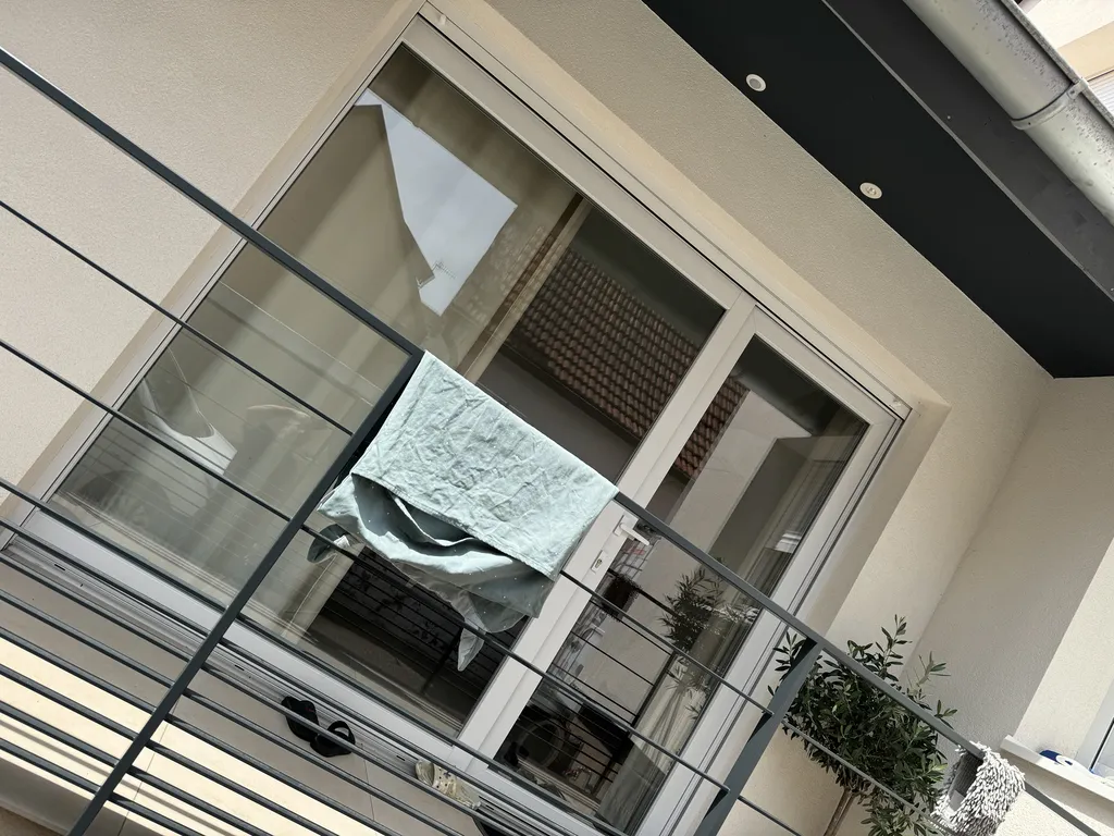 Remplacement porte-fenêtre PVC Aluplast Ideal 8000 avec volet roulant motorisé Somfy à Geispolsheim Bas-Rhin