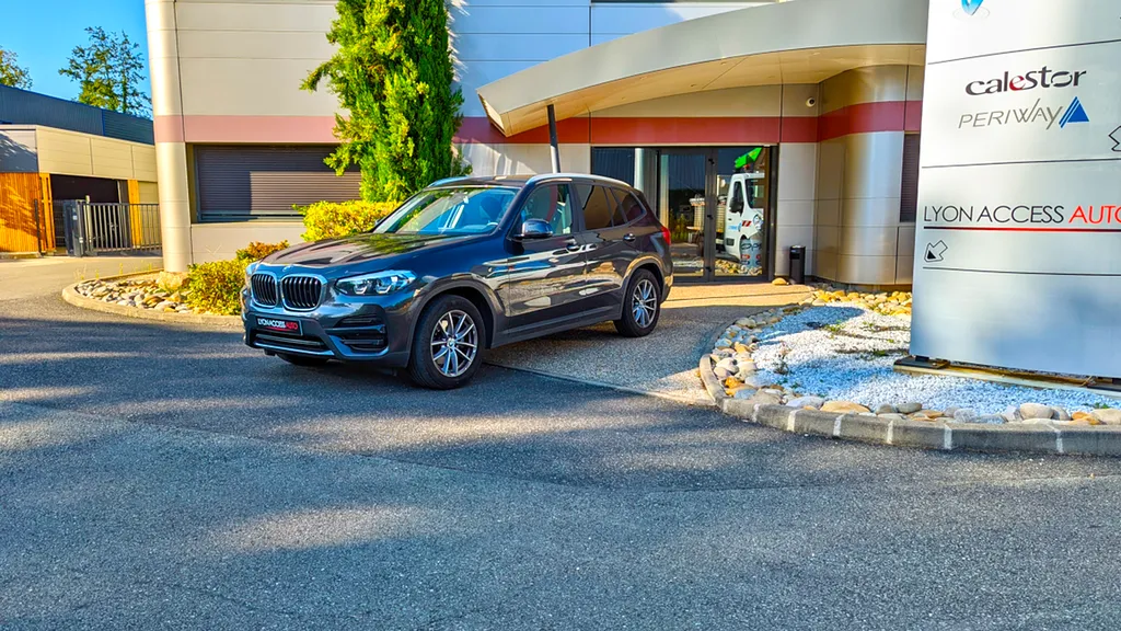 Pose d'alarme Cobra Vodafone et traqueur sur une BMW X3 chez Lyon Access Auto proche de Genas