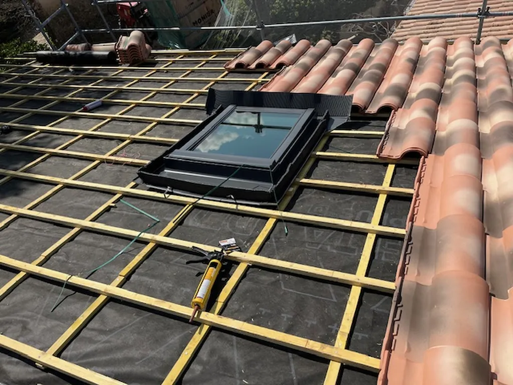 Placement des tuiles autour du velux