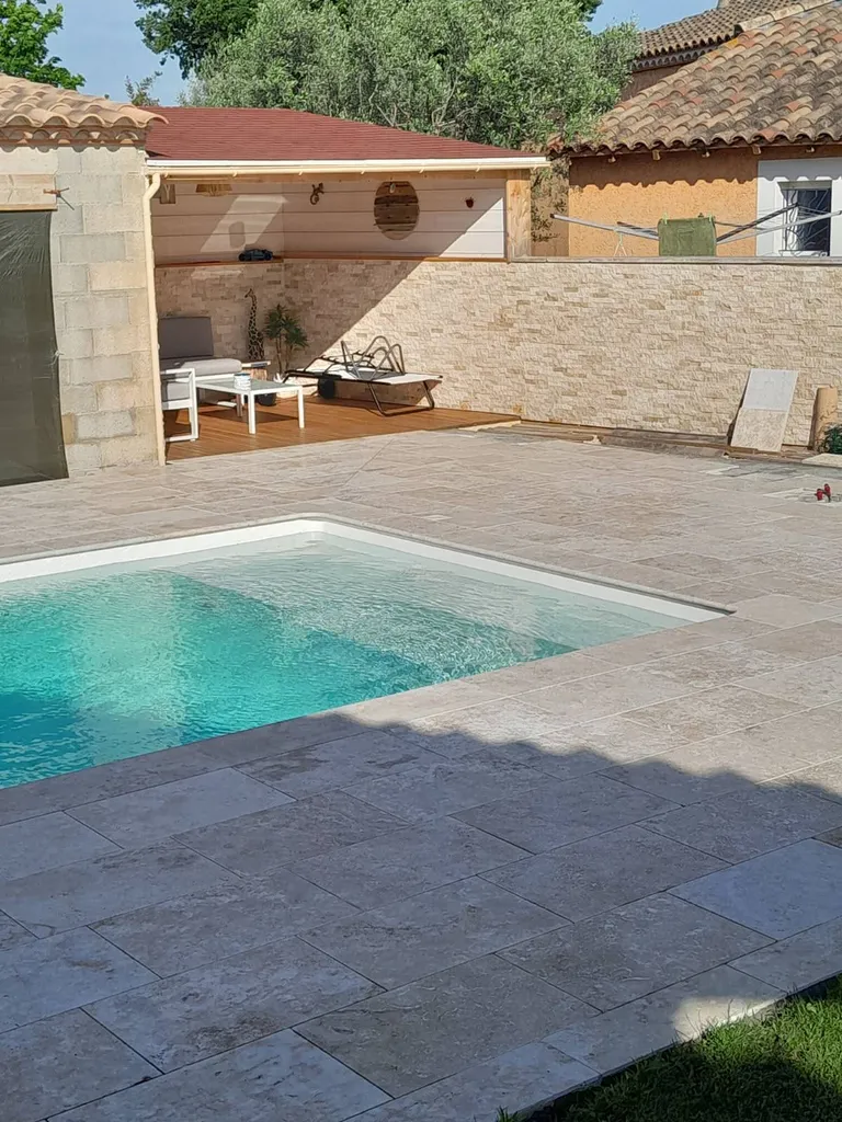 Notre zone d'activité pour ce servicePavé en travertin pour allée ou cour de maison