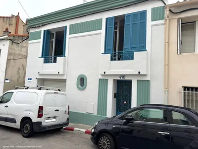 Travaux de rénovation de façade d'une maison individuelle avec cabinet d'architecture pour mission de déclaration administrative et coordination des travaux