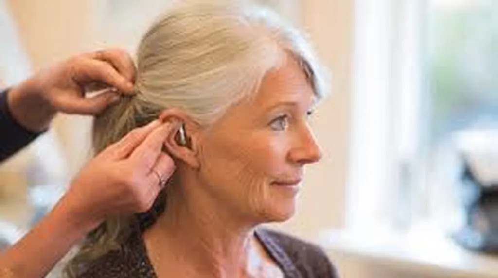 personne de 75 ans appareillée