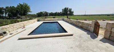 MARGELLES EN PIERRE NATURELLE DU MAROC - NIMES ANTIQUES AU FORMAT 40 X LL X 7.5 CM FINITION VIEILLIE