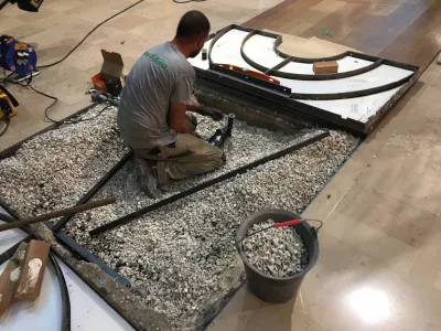 Plantation de palmiers stabilisés en galerie marchande sur Avignon